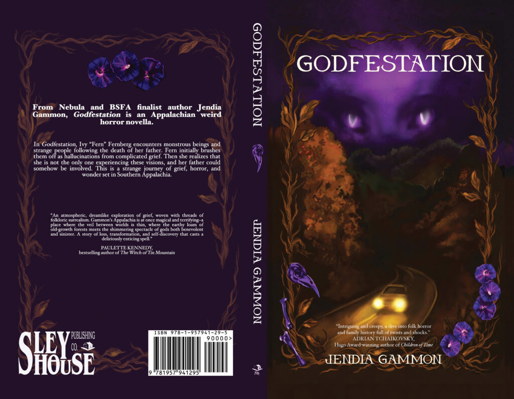 Full paperback wrap cover for Godfestation by Jendia Gammon. The left side represents the back cover, with a border of autumn leaves and vines surrounding white jacket text. A trio of purple morning glory blossoms is above the text. The spine has the title, author name, and Sley House publishing logo with a purple corvid skull mixed in. The right side of the image represents the front cover. Cover art for the novella GODFESTATION written by Jendia Gammon, art by Danika Corrall. A late autumn bronze leaf and vine border frames the book, with a purple animal skull on the lower left, and purple morning glory blossoms on on the lower right. Within the frame at the top, a large, strange purple face with oddly shaped eyes looms over a dark Southern Appalachian mountain range with a mountain road, down which a car drives with its headlights on.